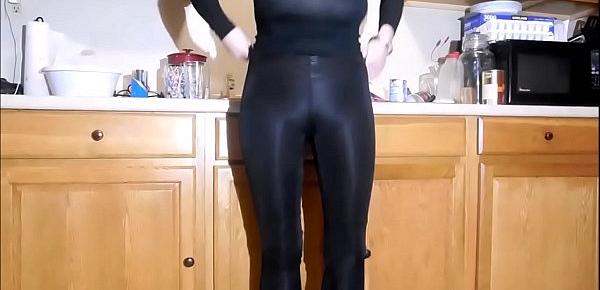 Teasing cock under layers latex